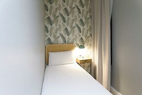 Fira Centric Apartments by gaiarooms