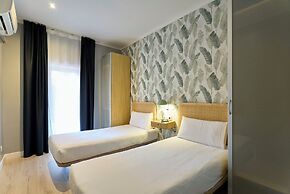 Fira Centric Apartments by gaiarooms