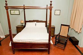 PalanquInn Heritage Suites
