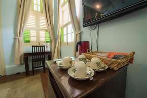 PalanquInn Heritage Suites