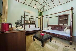 PalanquInn Heritage Suites