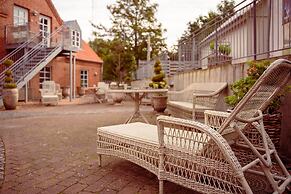 Boutique Hotel Postgården