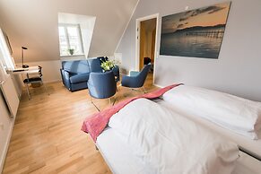 Sixtus Sinatur Hotel og Konference