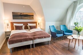 Sixtus Sinatur Hotel og Konference