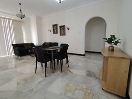 Del Sol Suites & Apartments