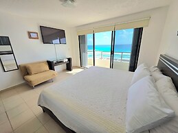Oceanfront white sand beach condo