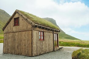 Múlafossur Cottages near Waterfall