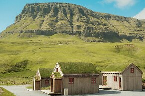Múlafossur Cottages near Waterfall