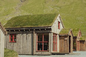 Múlafossur Cottages near Waterfall