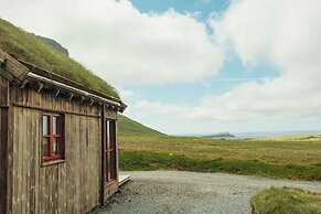 Múlafossur Cottages near Waterfall