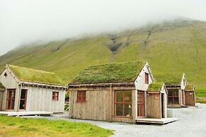 Múlafossur Cottages near Waterfall