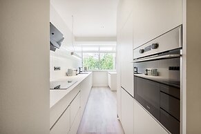 Silva Apartment by Olala Homes