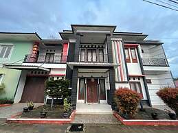 OYO 93143 Mega Raudhah Syariah
