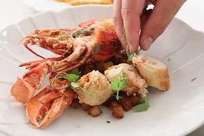 Hotel de la mer – Restaurant Tom Cariano