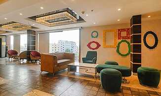 Fabhotel Twin Tree Suites