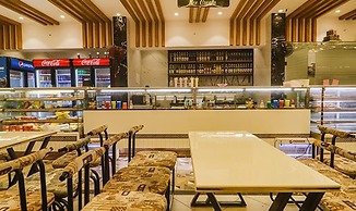 Fabhotel Twin Tree Suites
