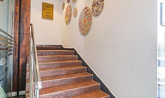 Fabhotel Twin Tree Suites