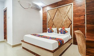 Fabhotel Twin Tree Suites