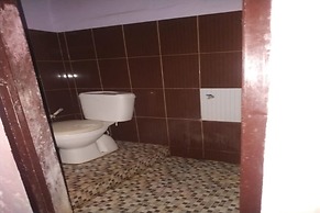 Hotel O Yellow White Guesthouse Palu