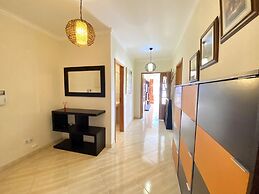 Quarteira Central by Homing