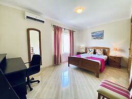 Quarteira Central by Homing