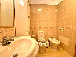 Quarteira Central by Homing