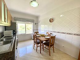 Quarteira Central by Homing