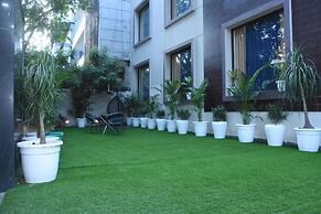 Posh Garden Inn