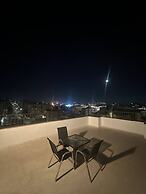 JRE Cozy Rooftop Near Al Services 24