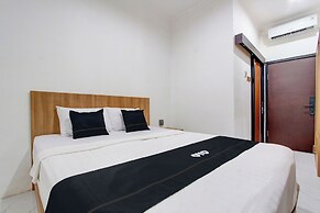 Capital O 93266 Palmier Hotel