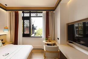 XISHU GARDEN INN