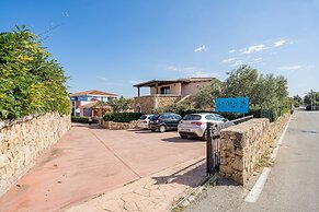 Residence with pool in Cala Girgolu