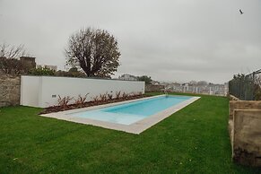 Home With A Pool by Vacationy