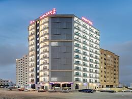 OYO Townhouse 156 Rose Hotel Apartments.