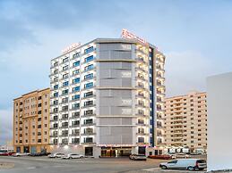 OYO Townhouse 156 Rose Hotel Apartments.