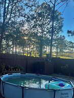 Pine Scape Lodge | Jacuzzi | BBQ | Pool | Mango Hosting