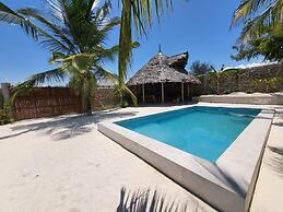 SAND BEACH PALM RESIDENCE