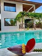 SAND BEACH PALM RESIDENCE