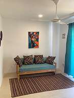 SAND BEACH PALM RESIDENCE