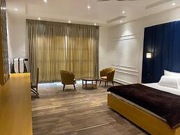 Mangalam Inn By AAA Grand