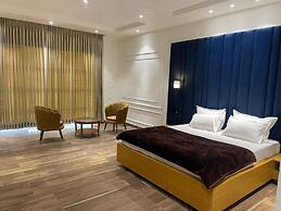 Mangalam Inn By AAA Grand