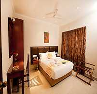 Blossoms Hotel and Service Apartment