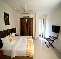 Blossoms Hotel and Service Apartment