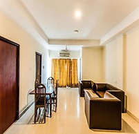 Blossoms Hotel and Service Apartment
