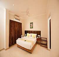 Blossoms Hotel and Service Apartment
