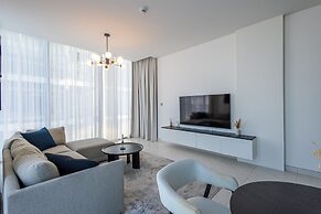 SuperHost - Serene 1BR in District One With Artificial Beach