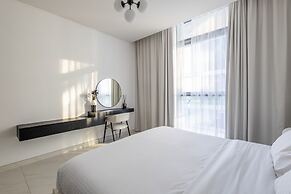 SuperHost - Serene 1BR in District One With Artificial Beach