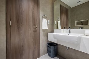 SuperHost - Serene 1BR in District One With Artificial Beach