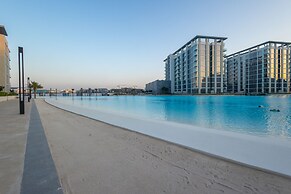 SuperHost - Serene 1BR in District One With Artificial Beach