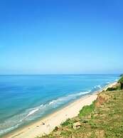 Pura Vida Varkala